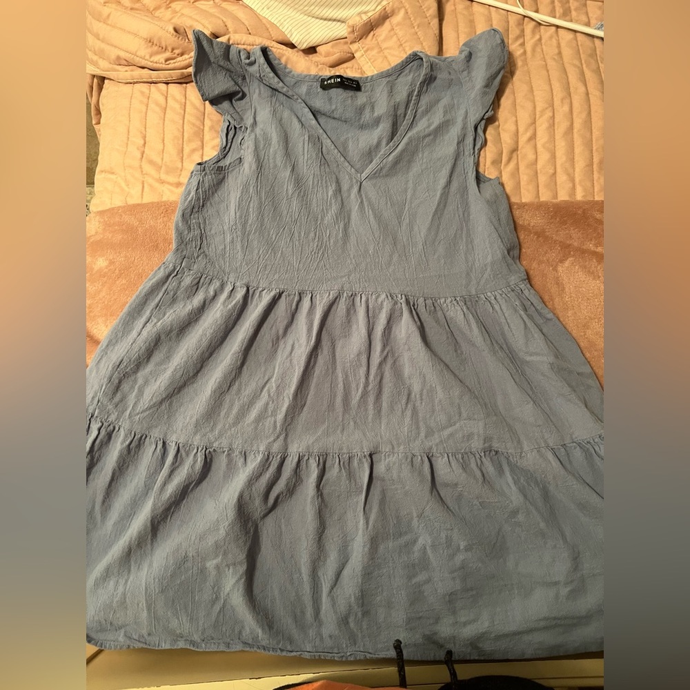 Cute mini dress. Blue with ruffles!